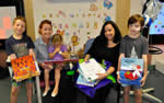 Tania Whitfield (author of The Adventures of Mavis the Tugboat) delivering books in Perth