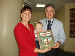 Nicole Ferrari and Bubba Luca delivering the books to Professor Nick Freezer at Monash Childrenâ€™s Hospital